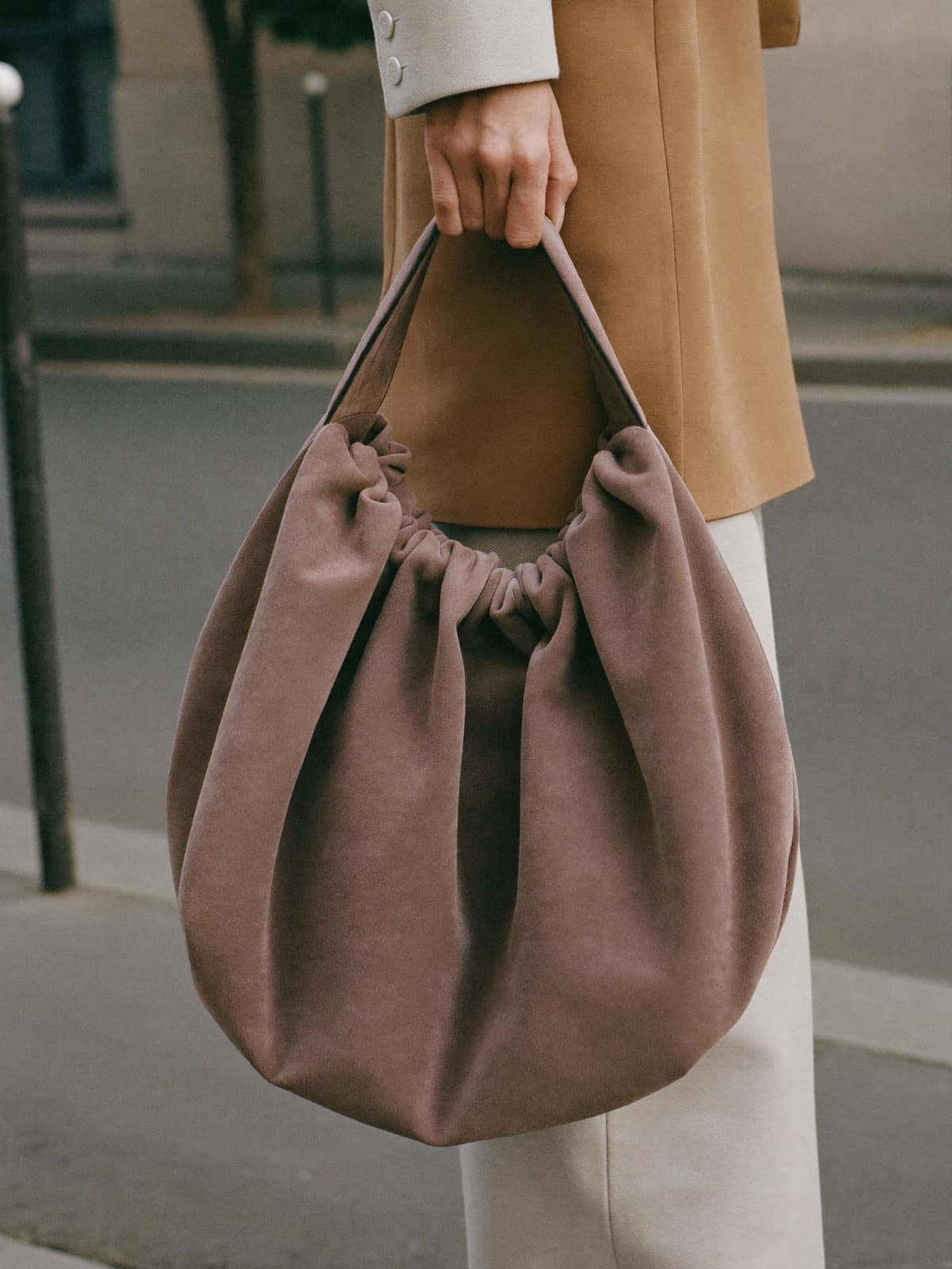 Cira Suede Hobo in Taupe, carried