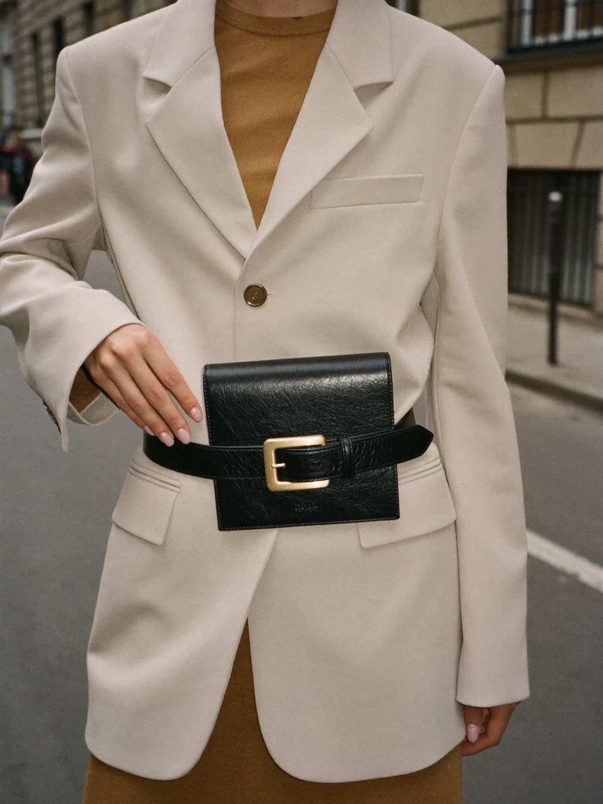 Delia Belt Bag in Black, carried