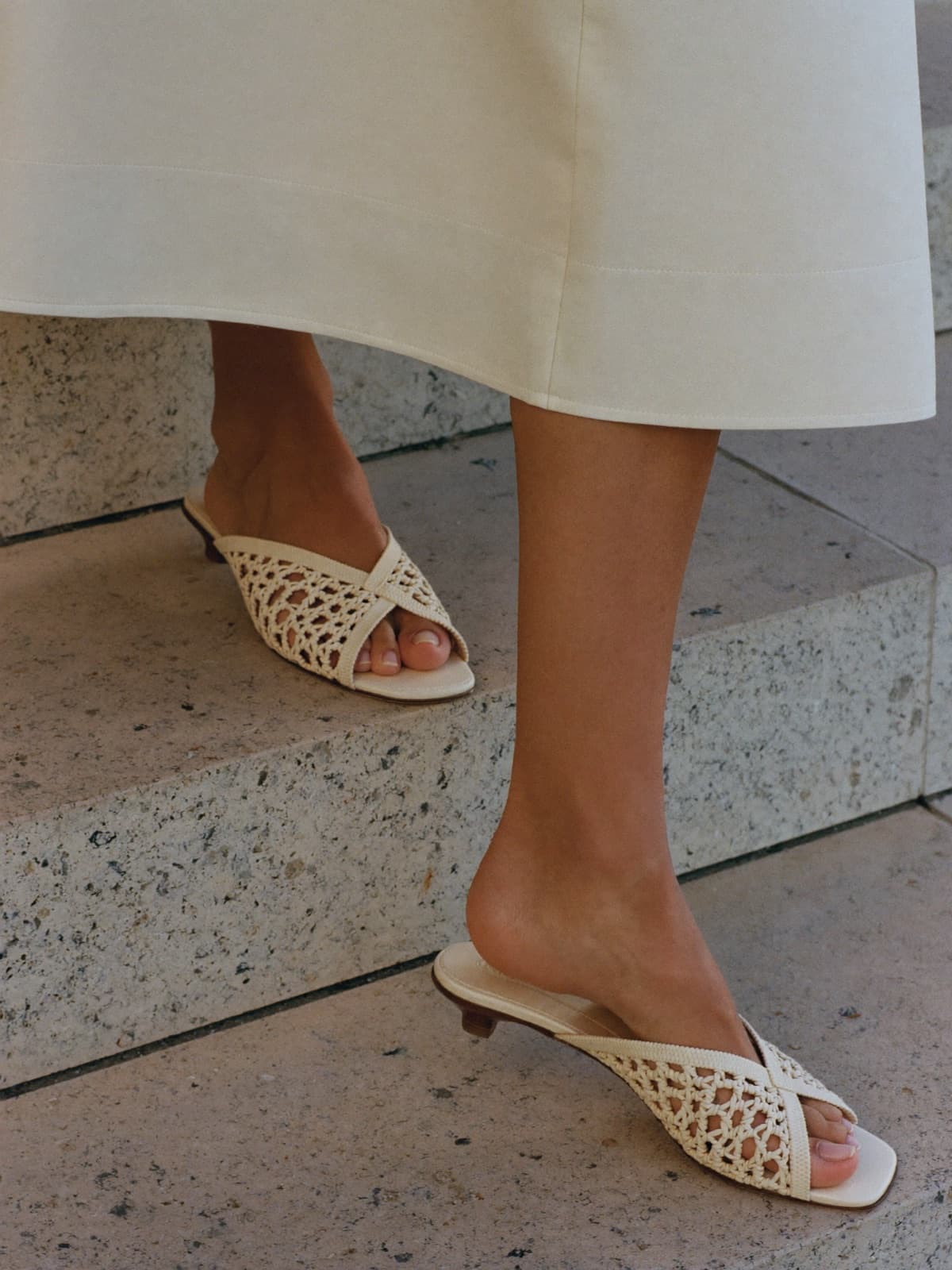 Dora Raffia Mule in Ecru, worn