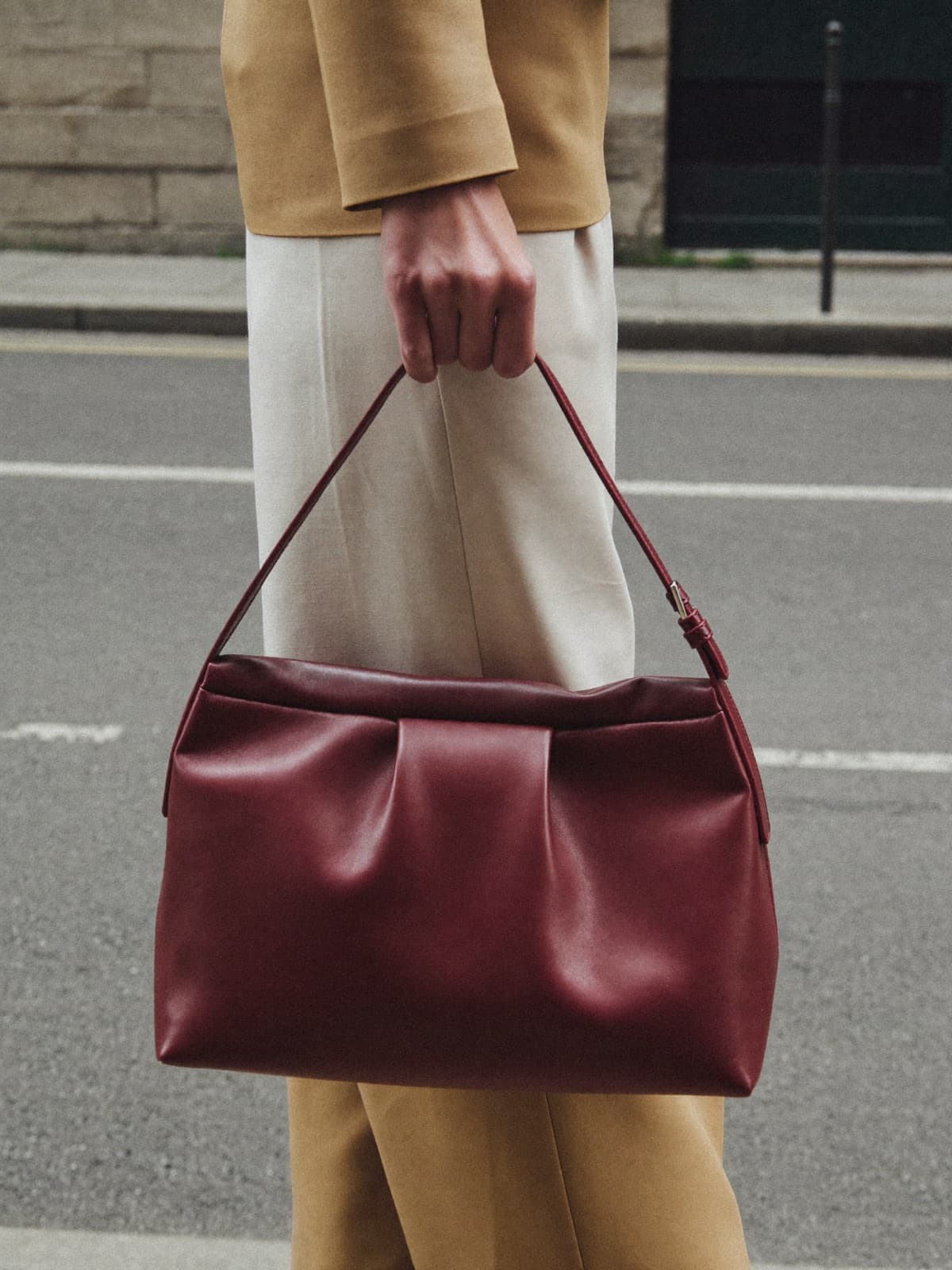 Gala Baguette in Oxblood, carried