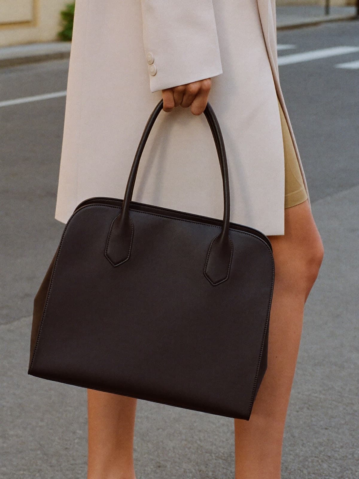 Hesper Document Tote in Black, carried