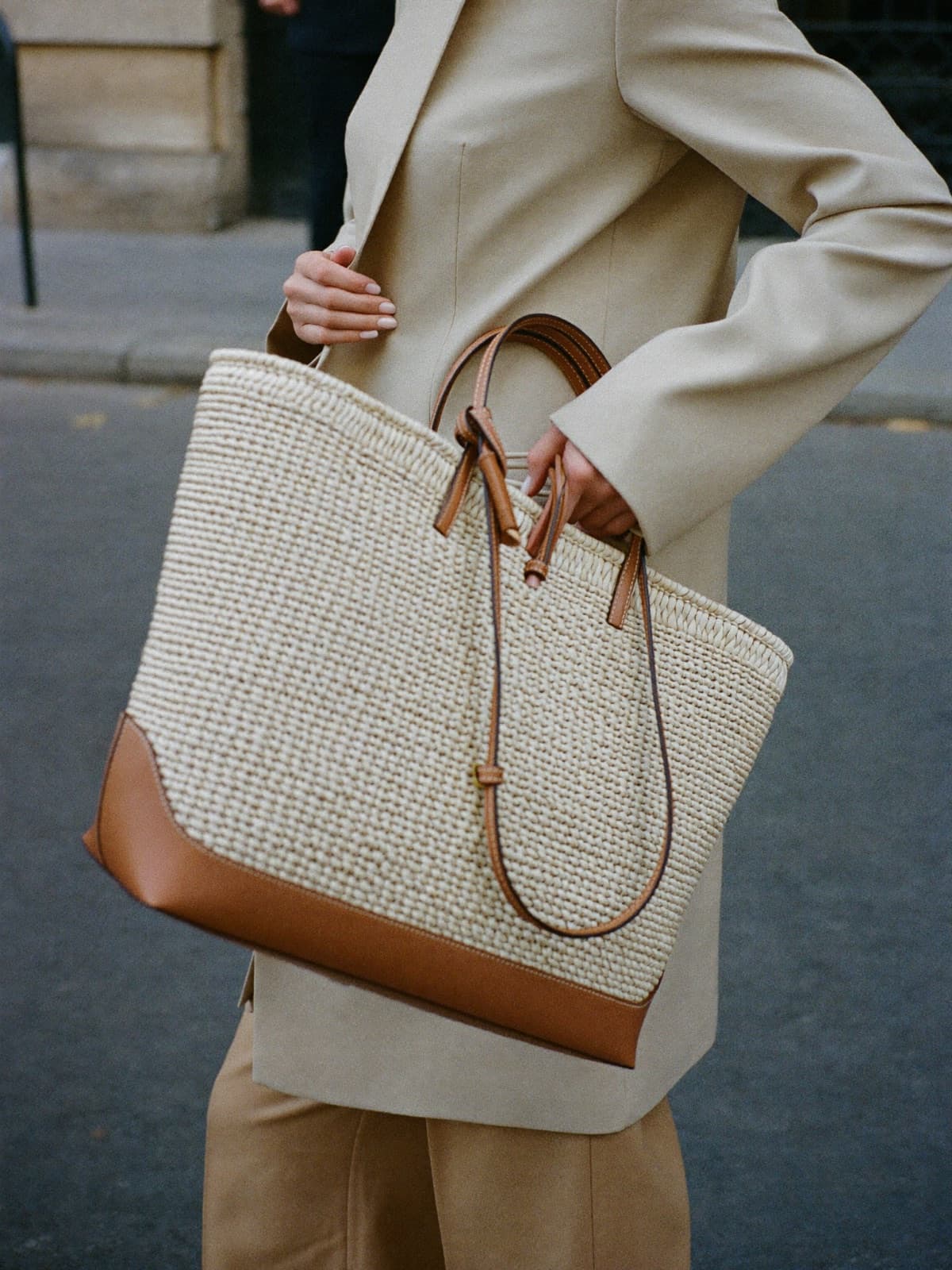 Luma Raffia Tote in Ecru, carried