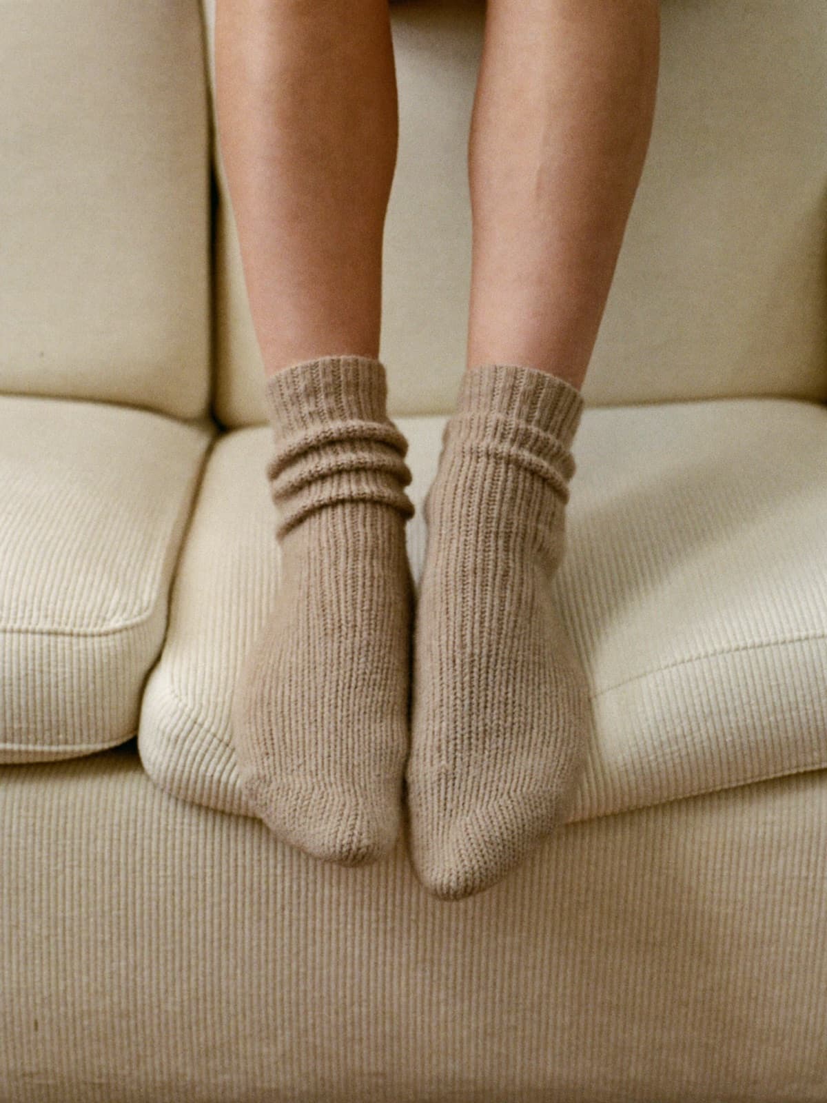 Mae Cashmere Socks in Oat, styled