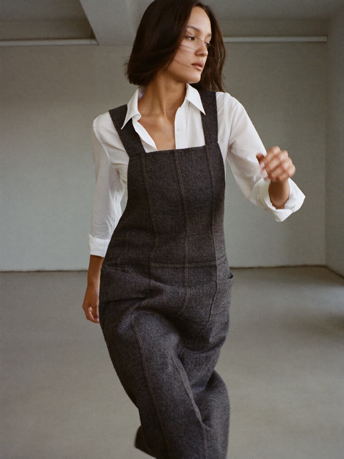 Mireille Pinafore in Charcoal, worn on location