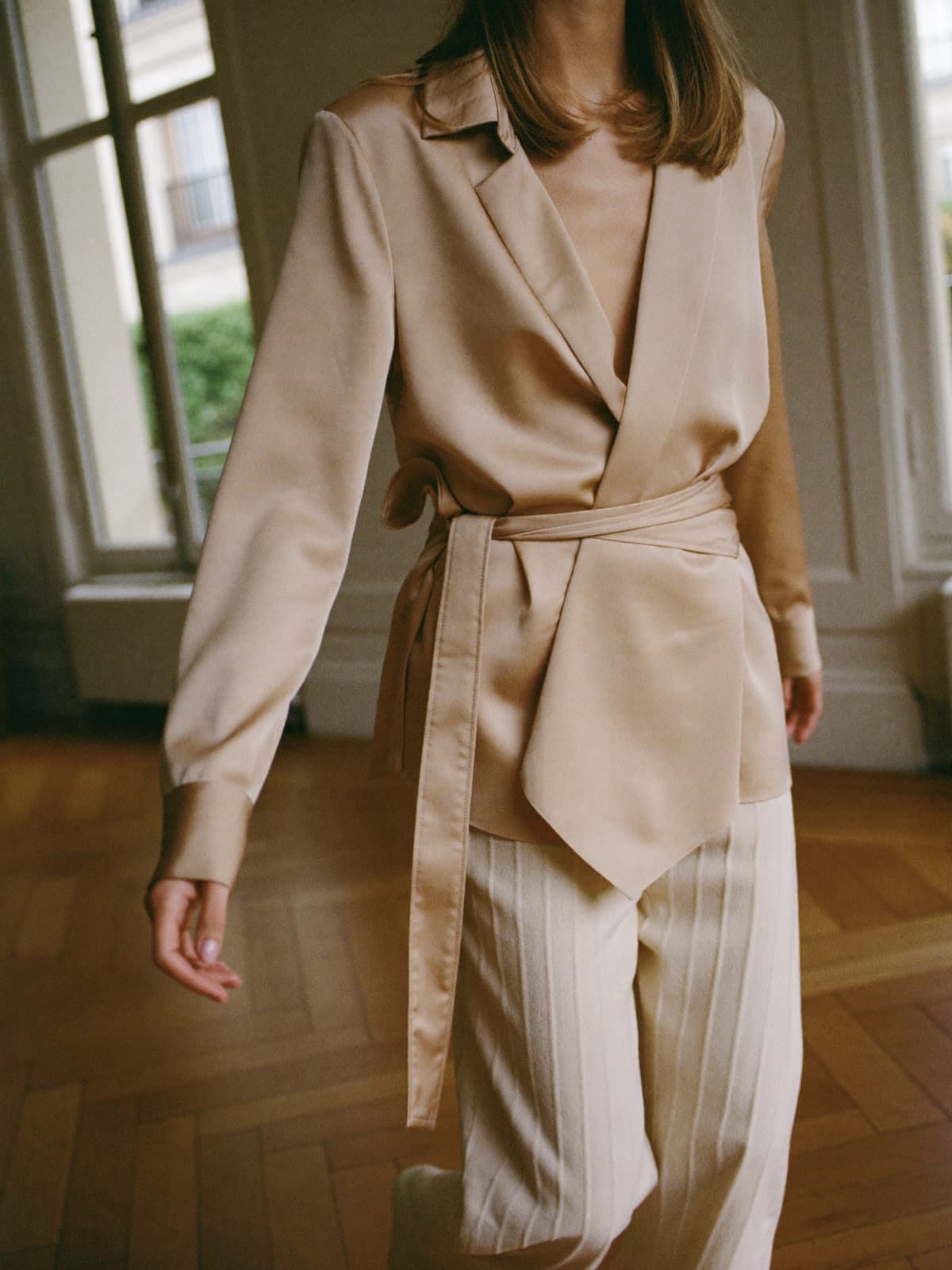 Neva Wrap Blouse in Champagne, worn on location