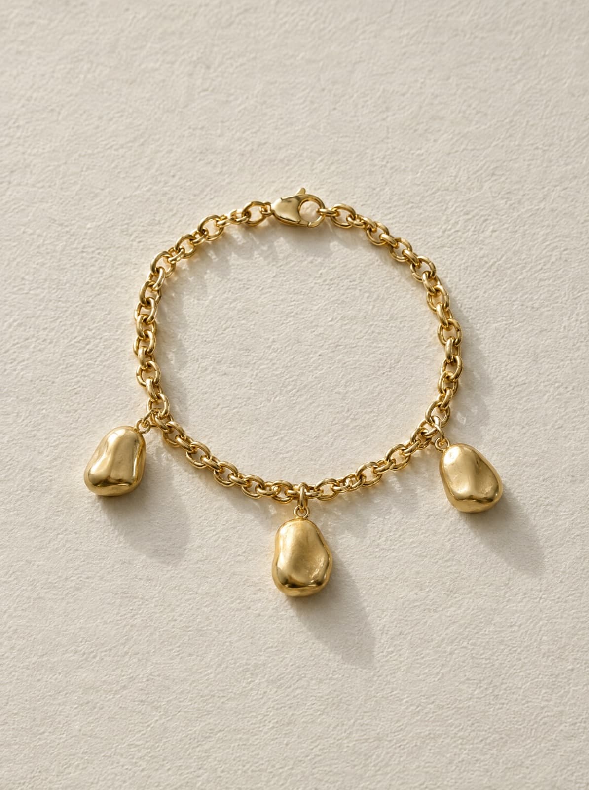 Pebble Charm Bracelet in Gold