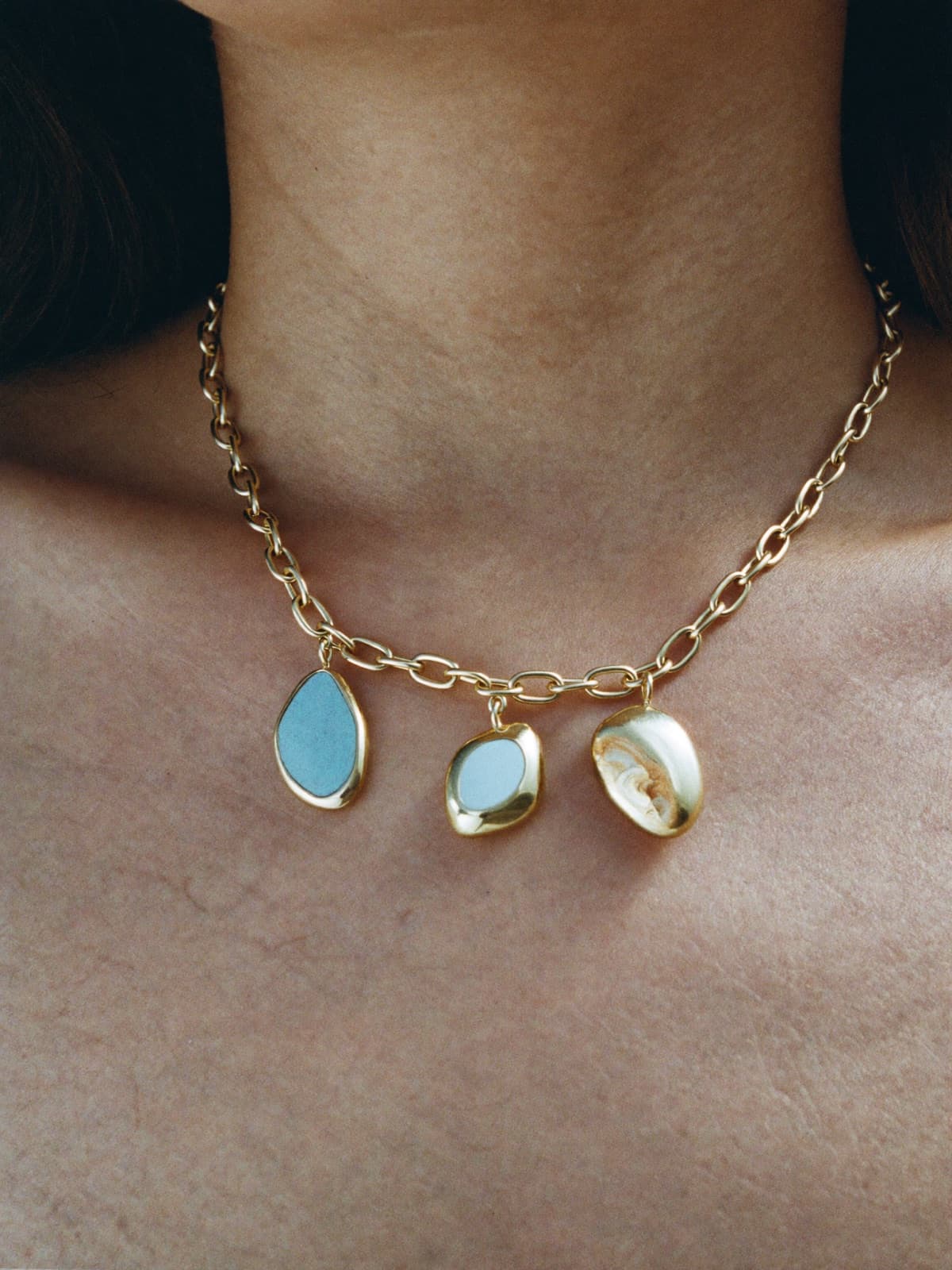 Pebble Charm Bracelet in Gold, worn