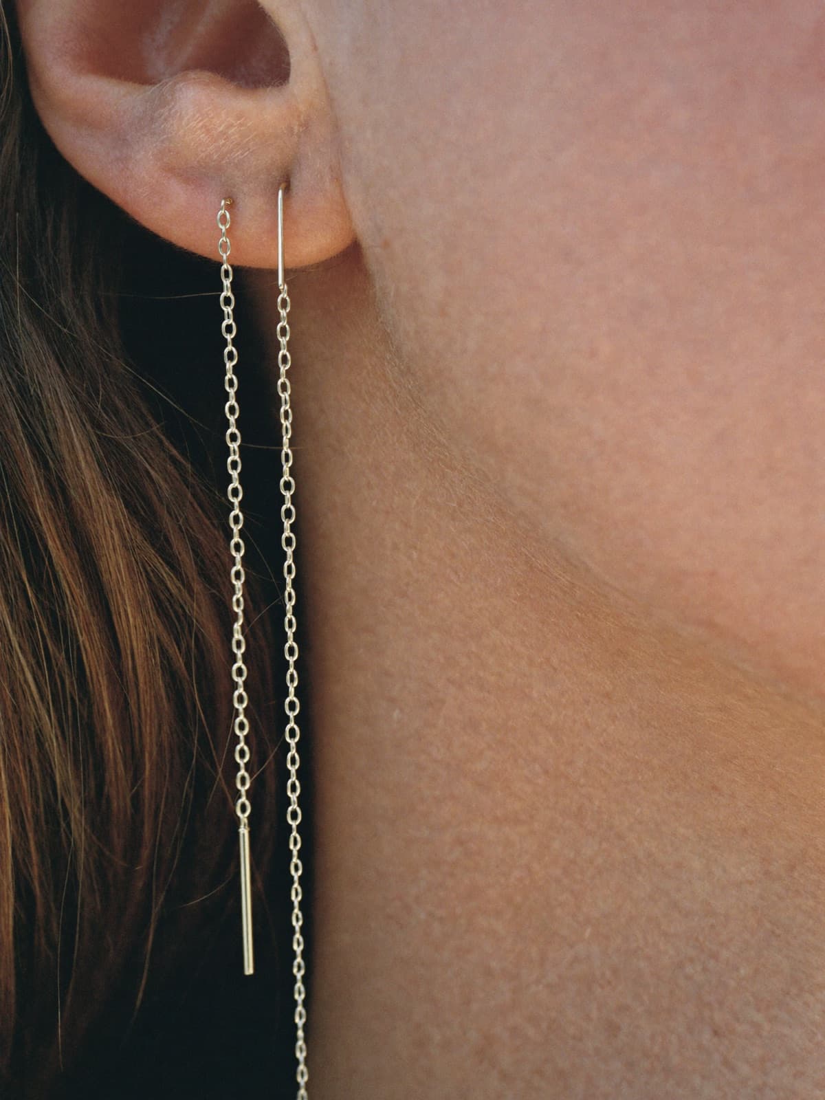 Peta Threader Earrings in Gold, worn
