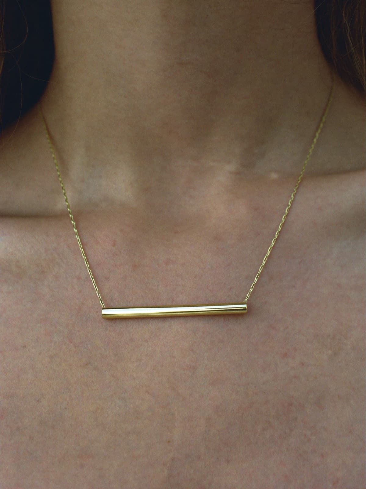 Reed Bar Pendant in Gold, worn