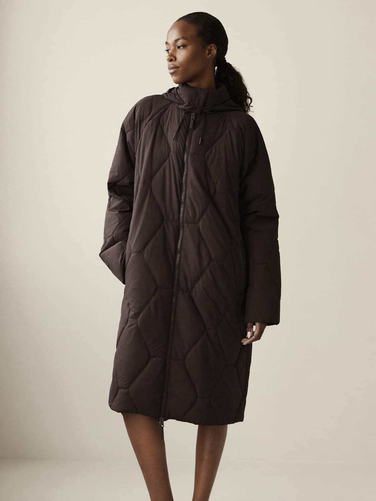 Suri Quilted Coat in Black, front view