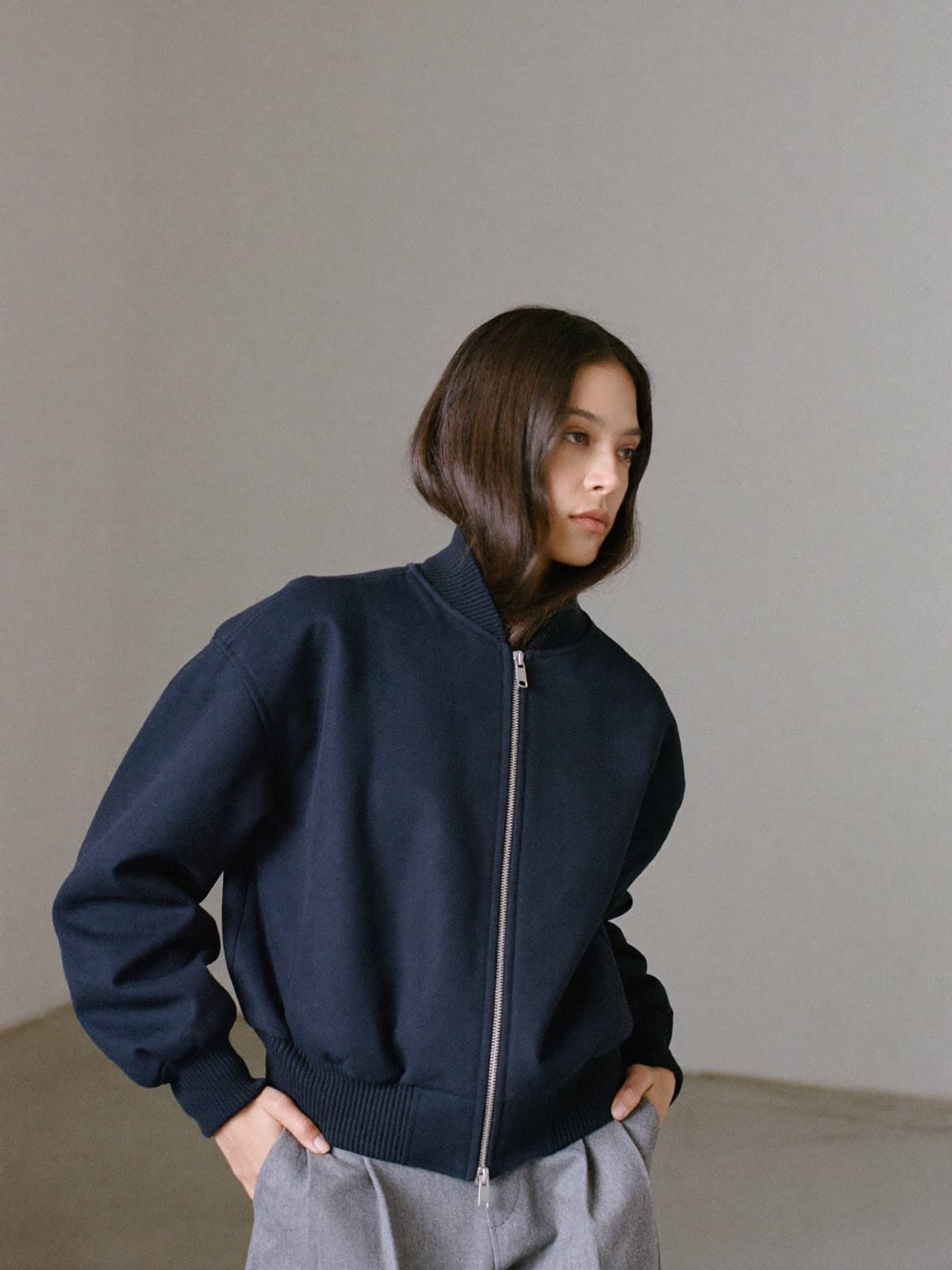 Tova Wool Bomber in Navy, worn on location