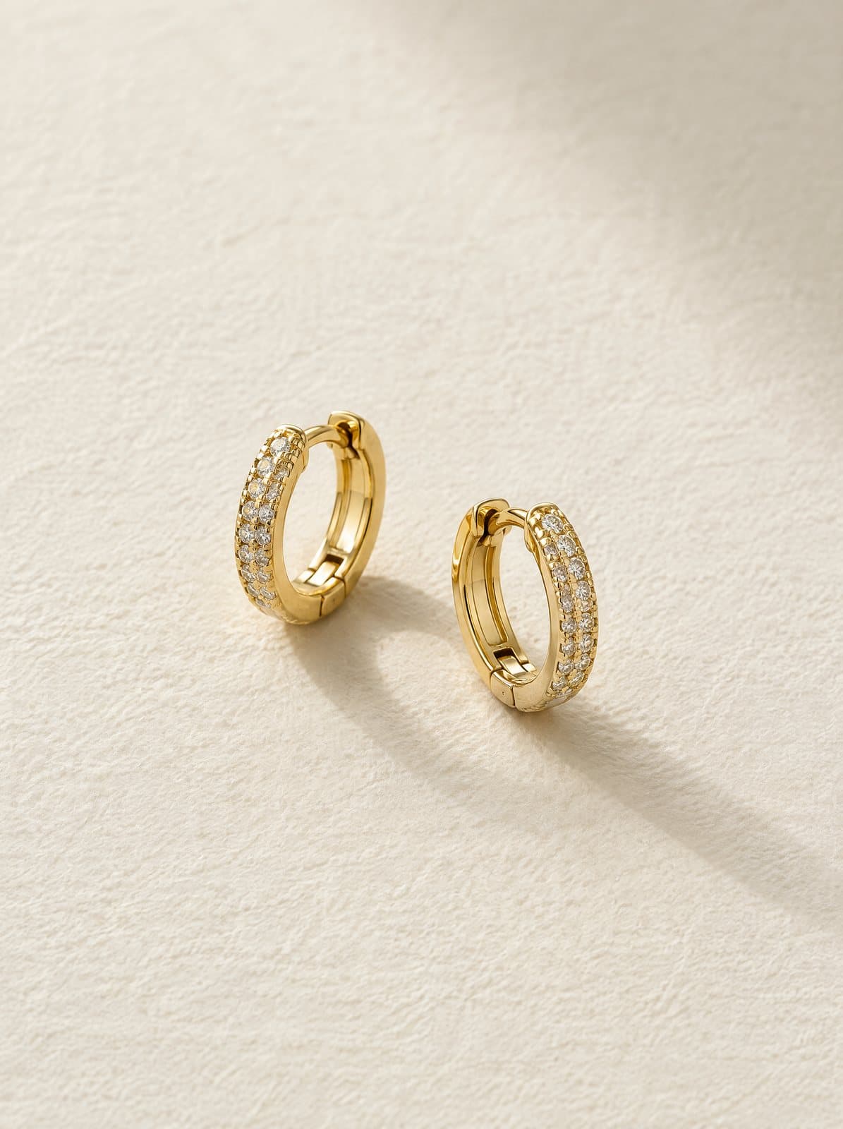 Vela Diamond Huggies in Yellow Gold